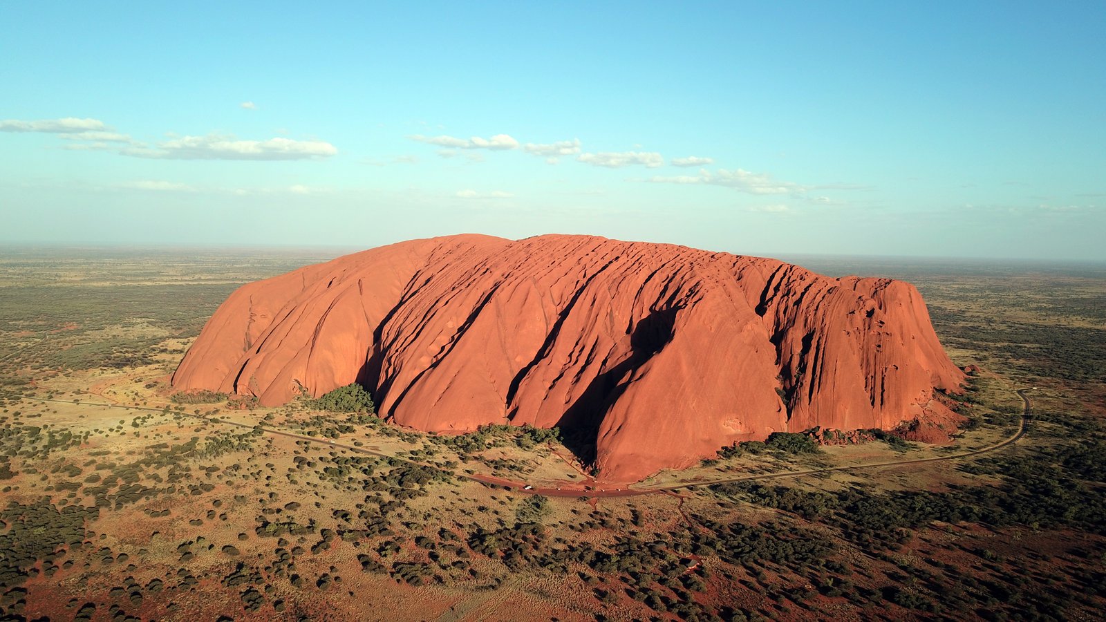 Top places to visit in Australia — Uluru glowing red at sunset in the Red Centre