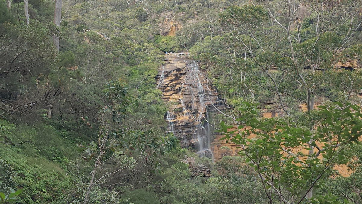 Wentworth Falls cascading down a sandstone cliff in the Blue Mountains